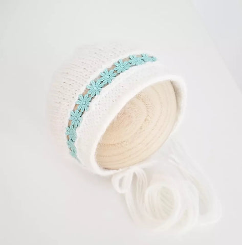 *prototype* teal floral ribbon detail knit bonnet